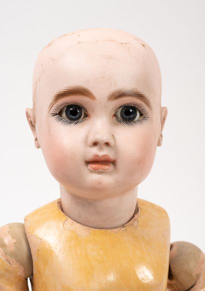 STEINER / JUMEAU Doll, porcelain head, closed mouth and eyes tilting with a side...