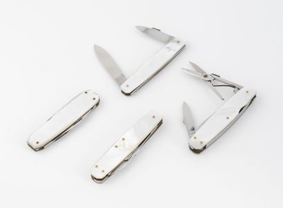 Four stainless steel penknives with two white...