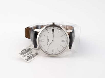 BAUME & MERCIER, Classima Montre bracelet d'homme. 
Boîtier rond en acier numéroté...