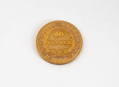 FRANCE Une pièce de 40 francs or Napoléon III, 1806.
Poids : 12,84 g.
Rayures et...