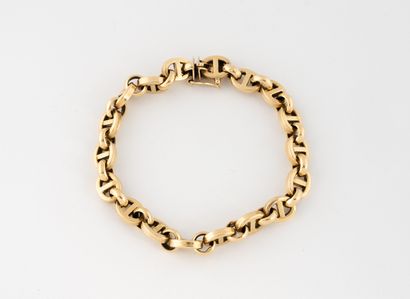 Bracelet en or jaune (750) à maille chaîne...