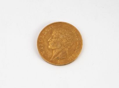FRANCE Une pièce de 40 francs or Napoléon III, 1806.
Poids : 12,84 g.
Rayures et...