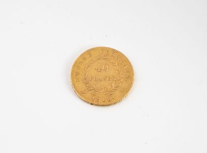 FRANCE Pièce en or de 40 Francs, 1812.
Poids : 12.8 g.
Usures et rayures.

