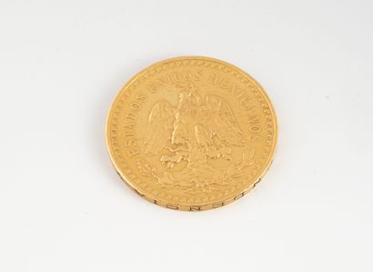 MEXIQUE 50 pesos gold coin.
Weight : 41,6 g.
Scratches and wear.