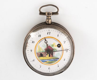 null Silver pocket watch (800).
White enameled dial decorated with a painted scene...