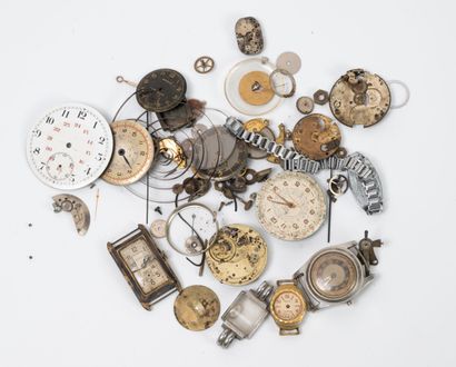 Small lot of clock elements (wheels, mechanisms,...