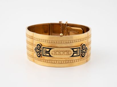 Bracelet plat articulé en or jaune (750)...