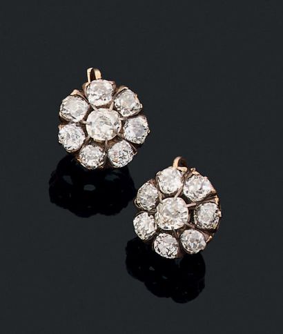 Pair of daisy-shaped yellow gold (750) and...