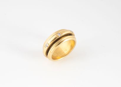 PIAGET Bague anneau mobile en or jaune (750) et diamants taille brillant en serti...