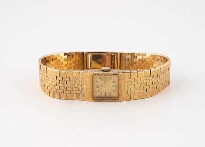 IWC Montre bracelet de dame en or jaune (750)
Boitier de forme carré.
Cadran à fond...