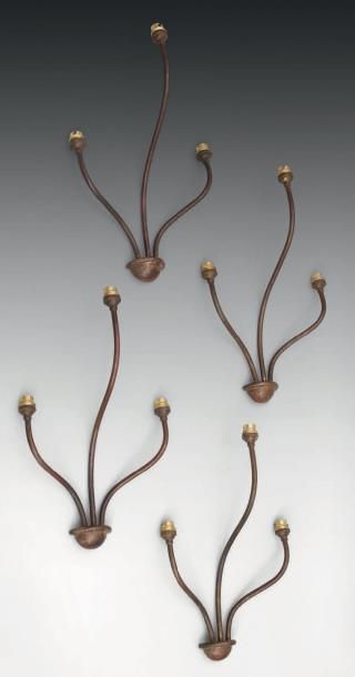 Jean Royère (1902-1981) Suite de quatre appliques, «modèle persane», à trois bras...