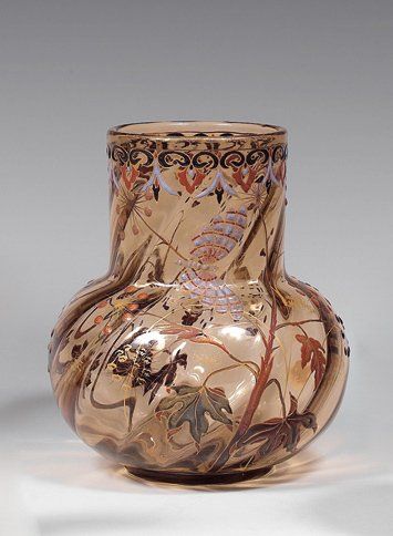Émile GALLÉ (1846-1904) Vase à corps sphérique et grand col annulaire torsadé. Epreuve...