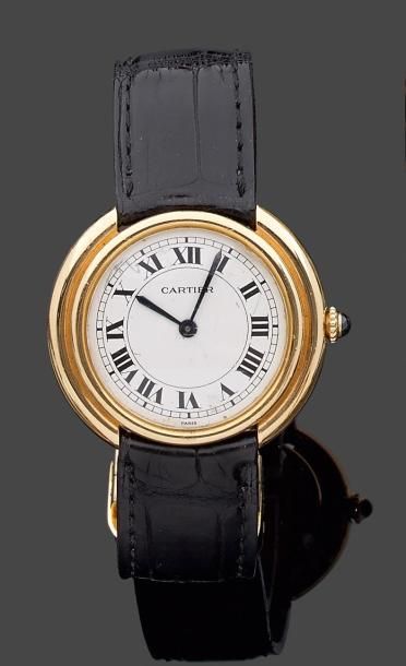 CARTIER Modèle «VLC» Montre bracelet d'homme. Boîtier circulaire à lunette godronnés...