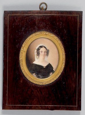 L. BCZEZIMSKI (XIXè siècle) "Portrait de femme en robe noire". Miniature ovale portant...