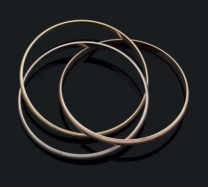 CARTIER Modèle «TRINITY» Trois bracelets joncs croisés en ors jaune, rose ou gris...
