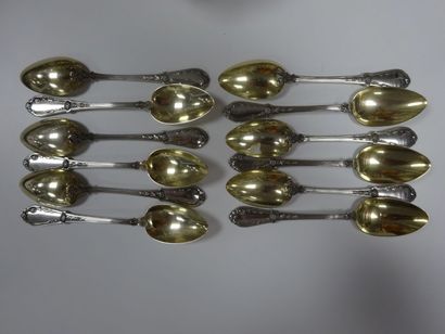 null Série de douze cuillères à thé en argent (925) blanc et doré à décor de fleurs.Epoque...