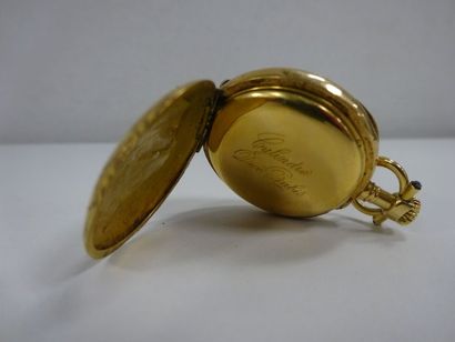 null Petite montre de col en or jaune (750) au couvercle à décor de fleurs ponctuées...