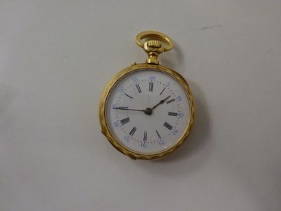 null Petite montre de gousset en or jaune (750) chiffrée, tour du cadran cannelé.
Poids...