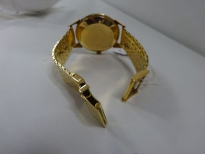 GAMY, Genève Montre bracelet d'homme en or jaune (750).Cadran rond à chiffres arabes...