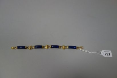 null Bracelet articulé en or jaune (750) formé de quatre batônnets incurvés de lapis...