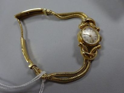 null OMEGA

Montre bracelet de dame en or jaune (750), cadran à fond crème, chiffres...