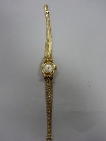 null PESAG

Petite montre de dame en or jaune (750), boitier rond, cadran à fond...