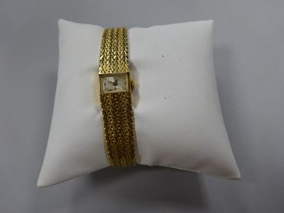 null Montre bracelet de dame en or jaune (750), petit cadran rectangulaire à chiffres...