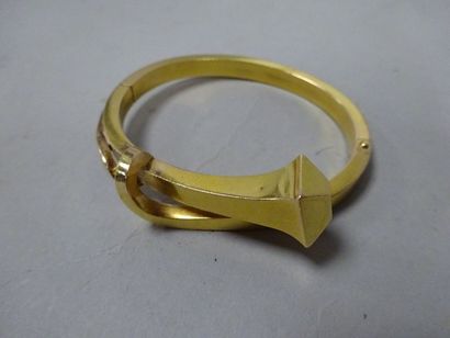 null Bracelet jonc ouvrant en or jaune (750) en forme de clou de fer à cheval.

Poids...