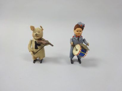 null SCHUCO 

Ensemble de automates:

- Le cochon violoniste 

- Le joueur de tambour....