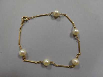 null Bracelet articulé en or jaune (750) à maillons allongés alternés de perles de...