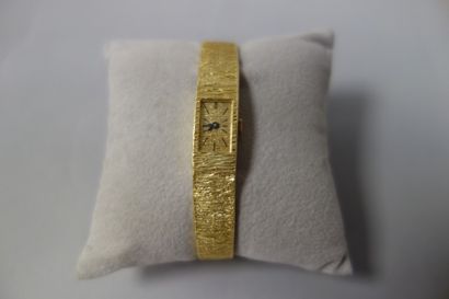 null Montre de dame en or jaune (750), boîtier rectangulaire ceint dans le bracelet...