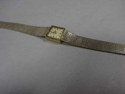 OMEGA Montre bracelet de dame en or gris (750), le boîtier carré, cadran signé blanc...