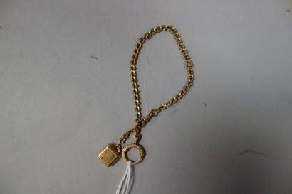 null Chaîne de montre en ors rose et jaune (750) à maille fantaisie retenant un pendentif...