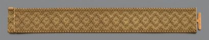 null Bracelet ruban en or jaune (750) à maille polonaise formant un motif de croisillon...