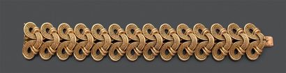 null Bracelet articulé en or jaune (750) composé d'entrelacs, de filins torsadés...