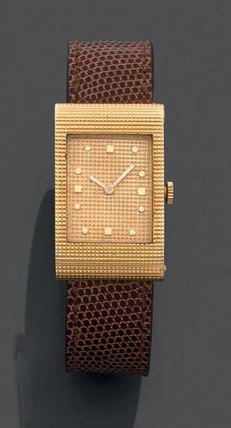 BOUCHERON Montre bracelet d'homme en or jaune (750) de forme rectangulaire à fermeture...