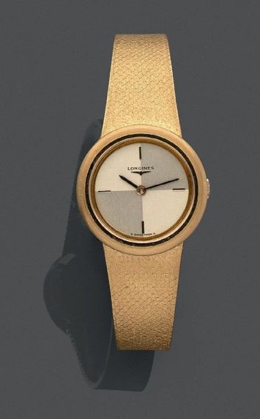 LONGINES Montre bracelet de dame en or jaune (750).
Le boîtier rond.
Cadran fond...