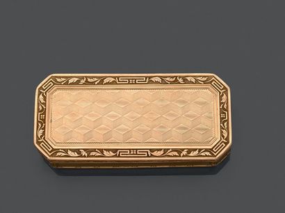 null Boîte tabatière en or jaune (750) de forme rectangulaire à pans coupés, décorée...