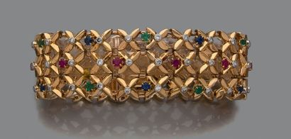 BOUCHERON Élégant bracelet articulé en or (750), composé de fleurettes disposées...