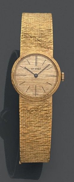 CLERC Montre bracelet de dame en or jaune (750), le boîtier circulaire à index bâtons...