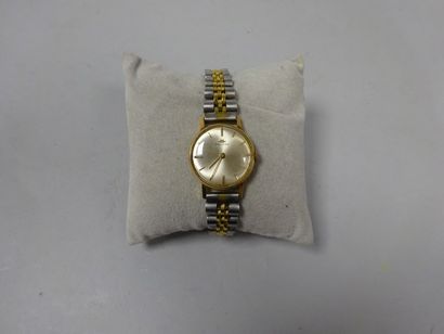 MOVADO Montre bracelet de dame. Boitier ronde en or jaune (750), cadran à fond champagne...