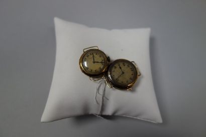 null Deux boîtiers de montres bracelets en or jaune (750). 

Mouvement mécanique...