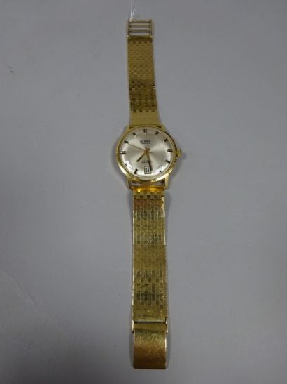 GERKA 

Montre bracelet d'homme en or jaune (750).

Boîtier rond, cadran à index...