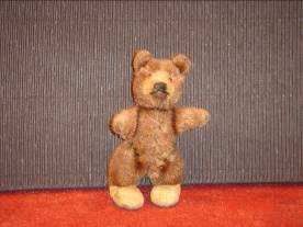 STEIFF Ours « Teddy Baby » en mohair brun, yeux en verre marron, pieds et museau...