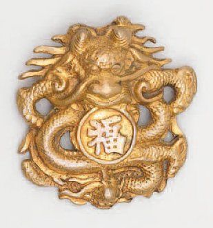 LINE VAUTRIN (1913-1997) Broche dragon en bronze doré, signé du cachet frappé en...