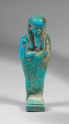null Oushebti en faïence bleue, Anépigraphe Egypte, XXXème dynastie. H.: 12,5 cm....
