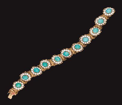 null Bracelet articulé en or jaune, composé de onze motifs, chacun serti d'une turquoise...