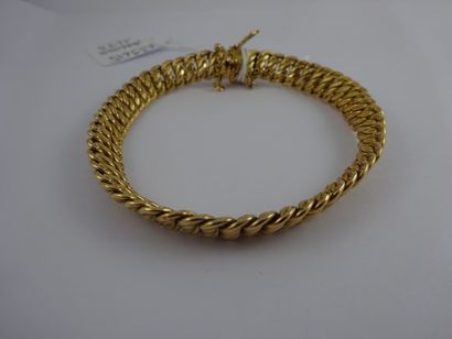 null Bracelet gourmette américaine en or jaune (750). Fermoir à cliquet, chaînette...