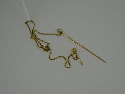 null Epingle de cravate en or jaune (750) ornée d'une perle de culture blanche.
Manque...