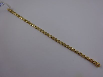 null Bracelet ligne en or jaune (750) à maillons circulaires articulés, chacun orné...